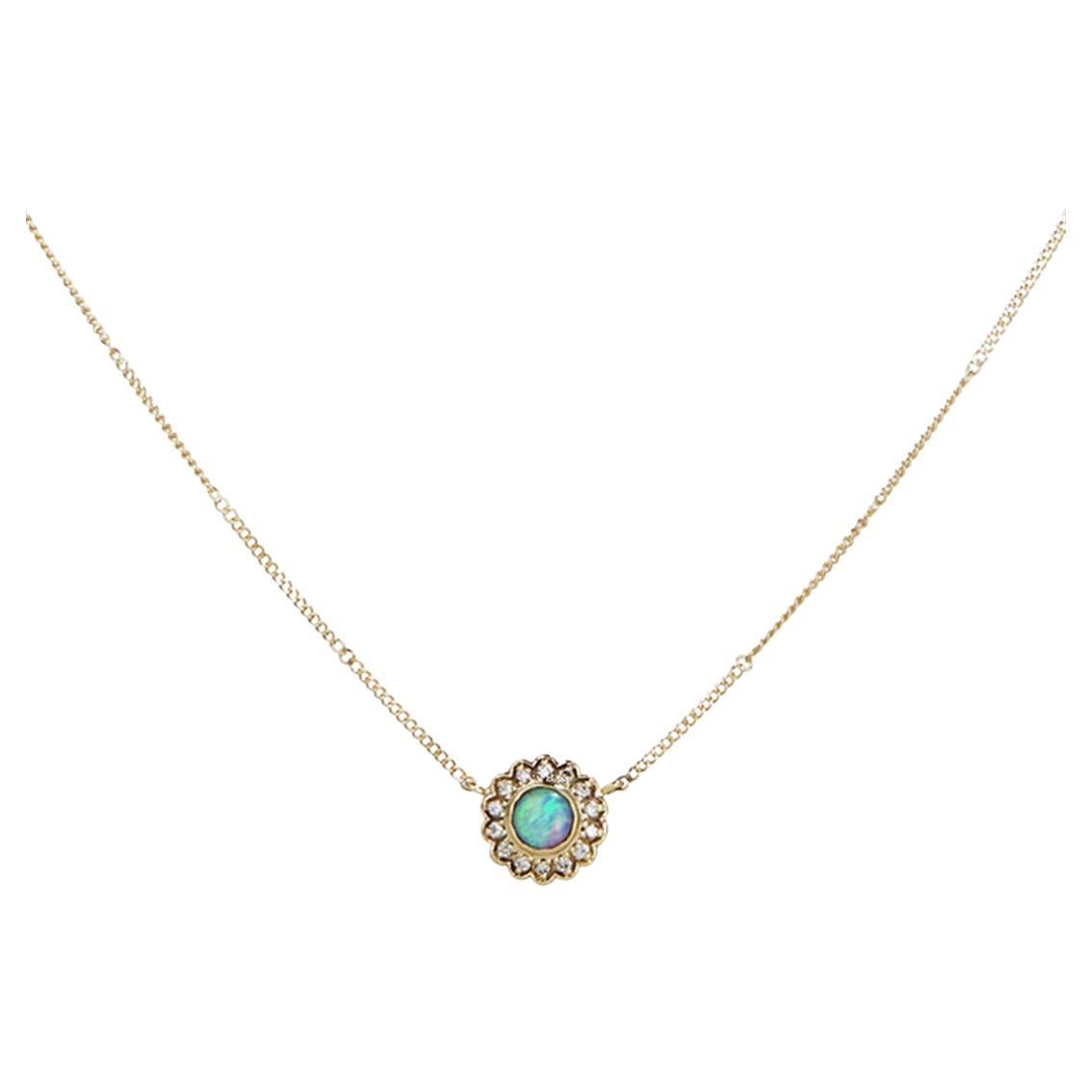 DETAILS
COLOR: Yellow gold
COMPOSITION: 14kt yellow gold
Center Australian opal totalling 0.19ct
Diamonds totalling 0.085ct  

SIZE AND FIT
Pendant 9.3 x 9.3mm 
Chain length 42cm