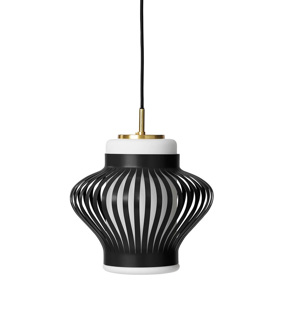 Opal Lamella Black Noir Pendant by Warm Nordic
Dimensions: D25.5 x H25 cm
Material: Lacquered steel, Sand blasted opal glass
Weight: 3.2 kg
Also available in different colours. Please contact us.

The Opal Lamella pendant was designed in the