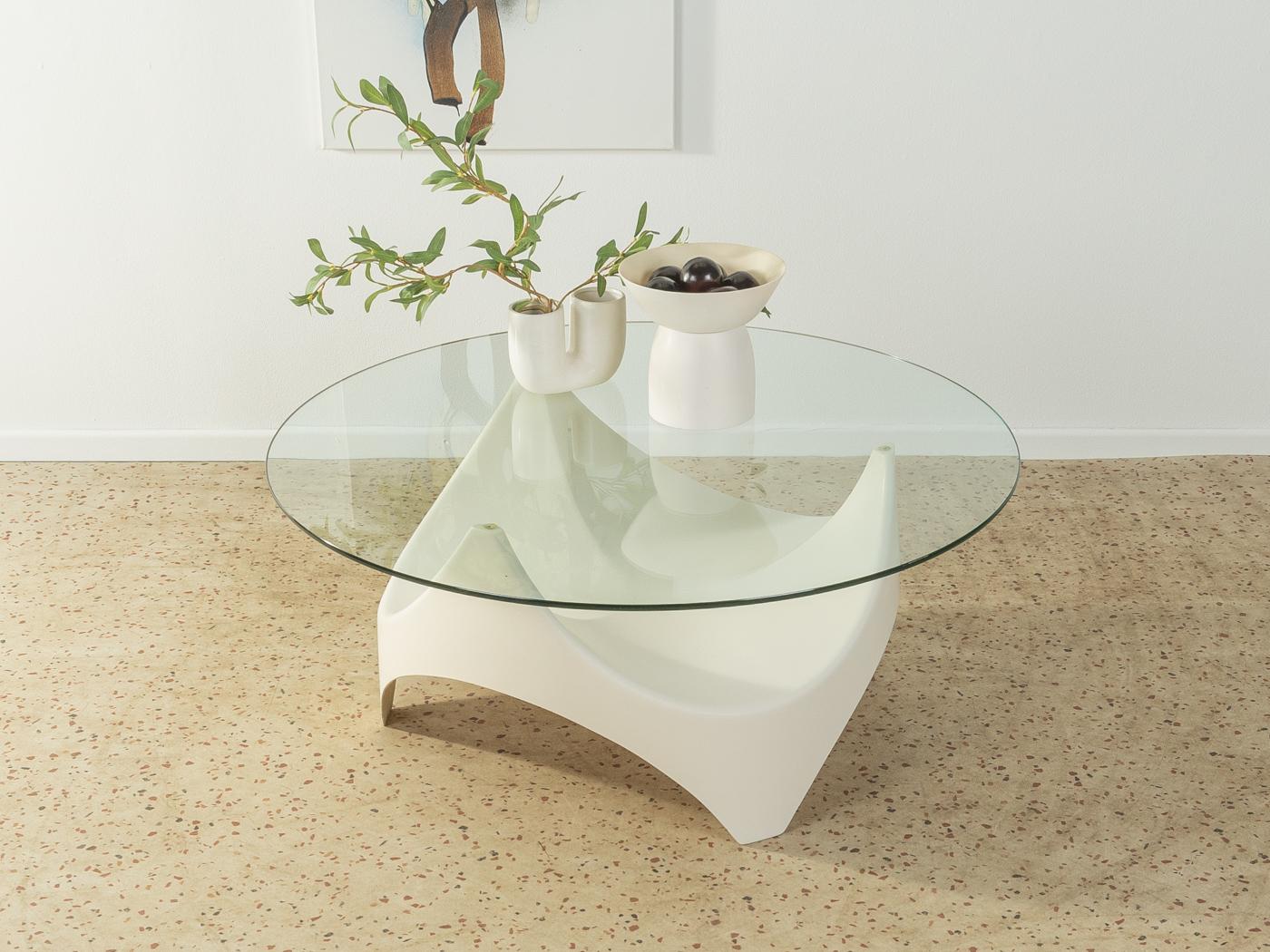 Space Age coffee table by Opal Möbel from the 1970s. High-quality plastic frame painted white with a glass table top.

Quality Features:
 very good workmanship
 high-quality materials
 Made in Germany, manufacturer: Opal Möbel.