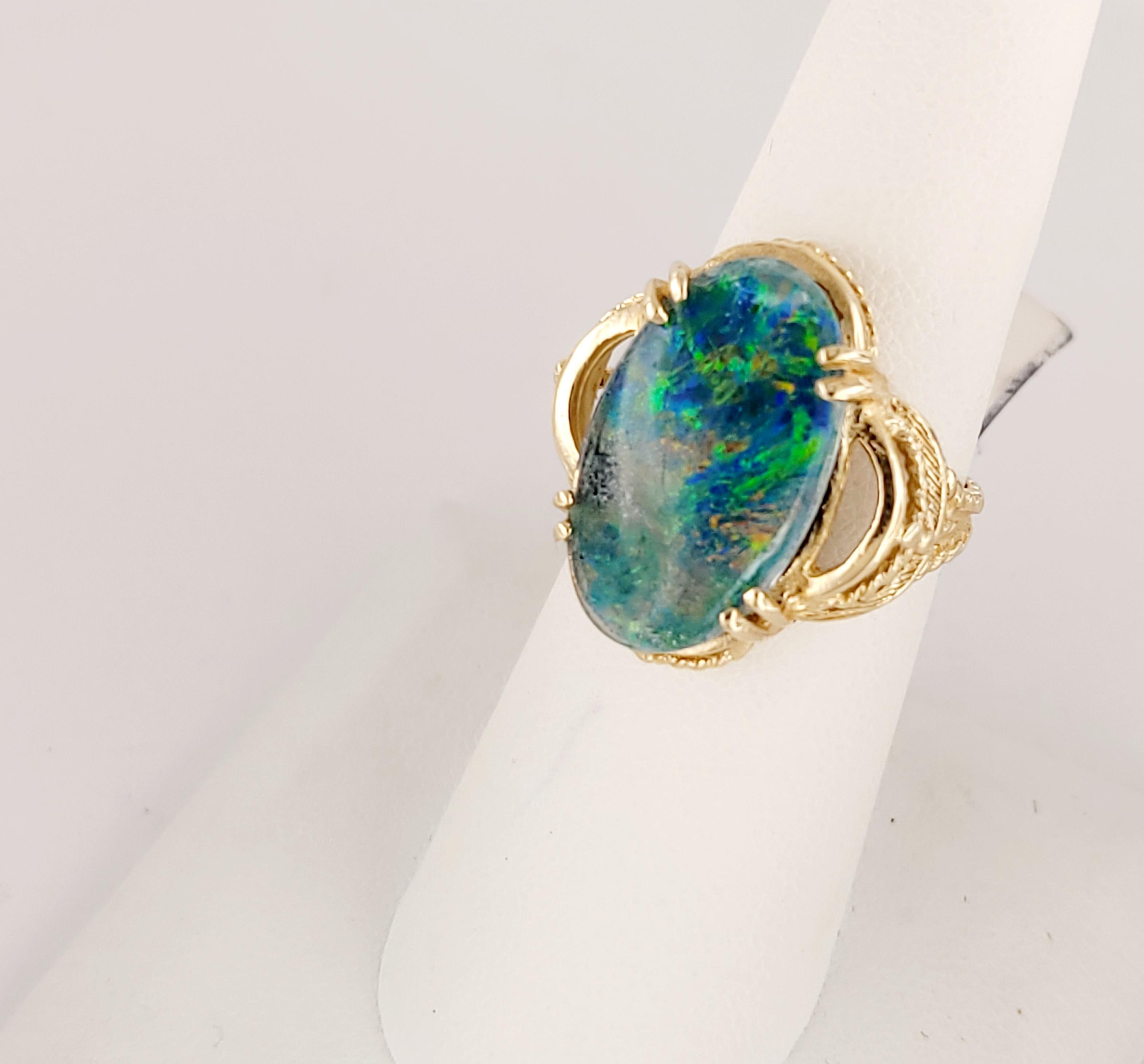 Bring color into your life!
Vintage ring with a beautiful opal doublet.

Materials: 14k
Weight: 6g
Size: 6.75
Stone: 19.3 x 11.5