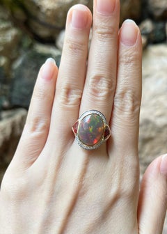 Opal, Orange Sapphire and Diamond Ring set in 18K Gold Settings