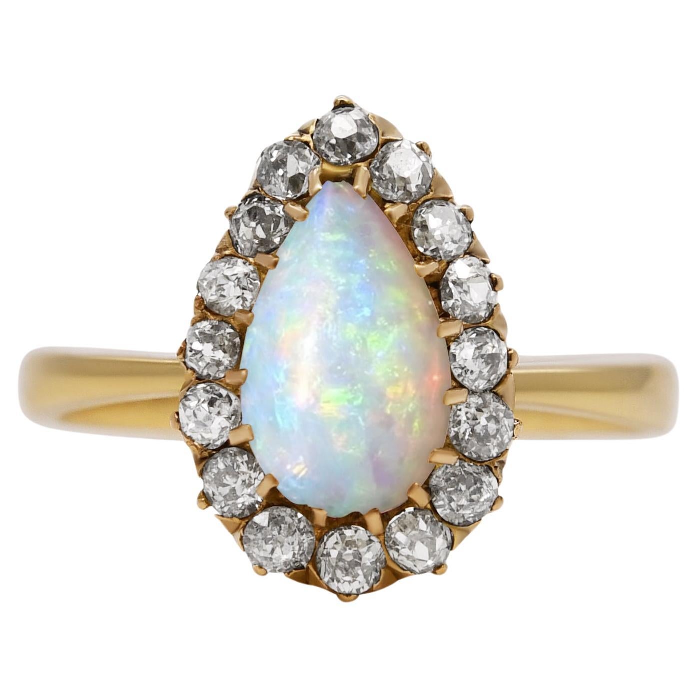Opal Pear and 0.32 Carat Old Mine Cut Diamond Ring For Sale