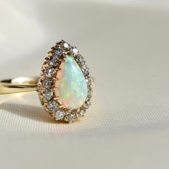 Opal Pear and 0.32 Carat Old Mine Cut Diamond Ring