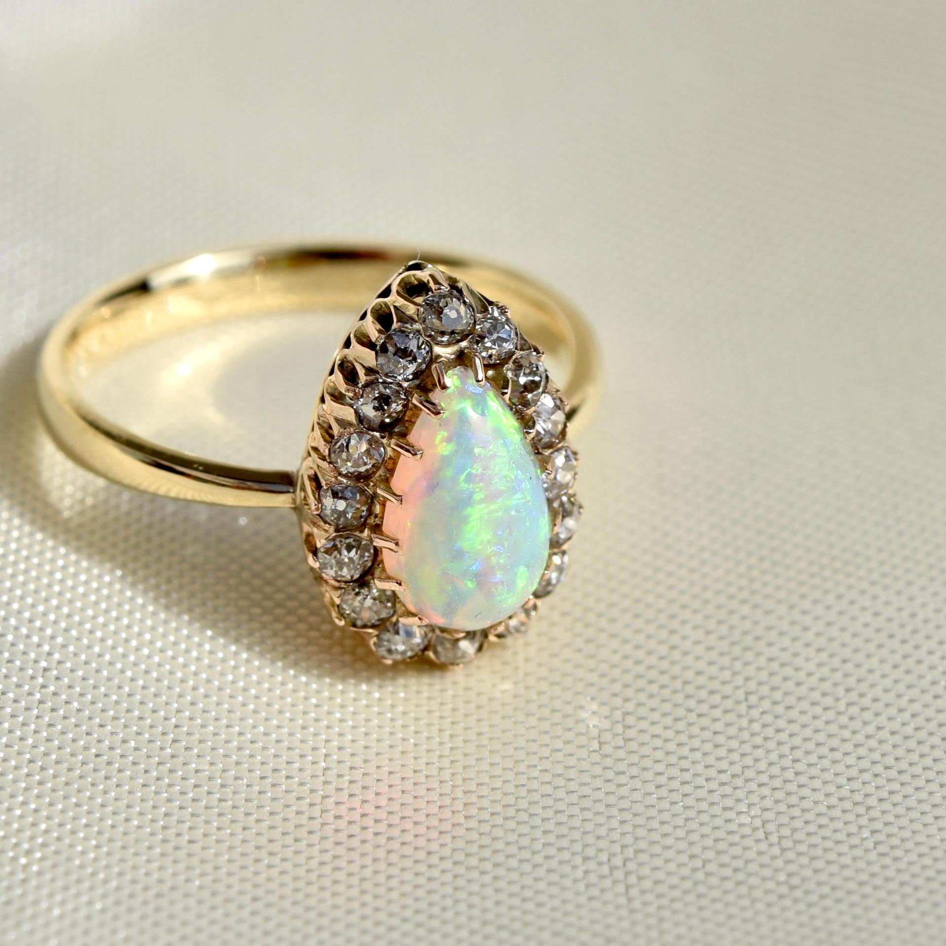Art Nouveau Opal Pear and 0.32 Carat Old Mine Cut Diamond Ring For Sale