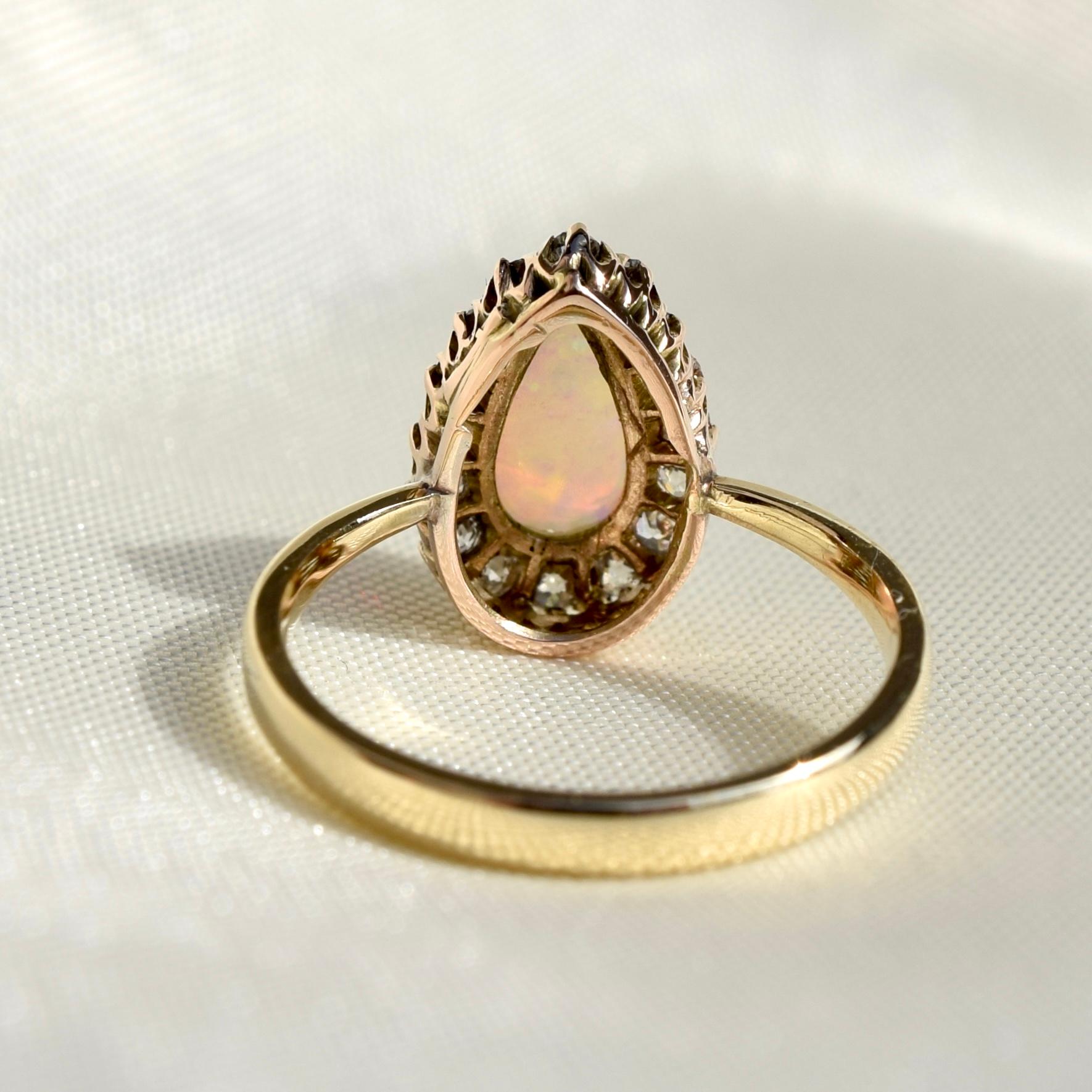 Women's Opal Pear and 0.32 Carat Old Mine Cut Diamond Ring For Sale