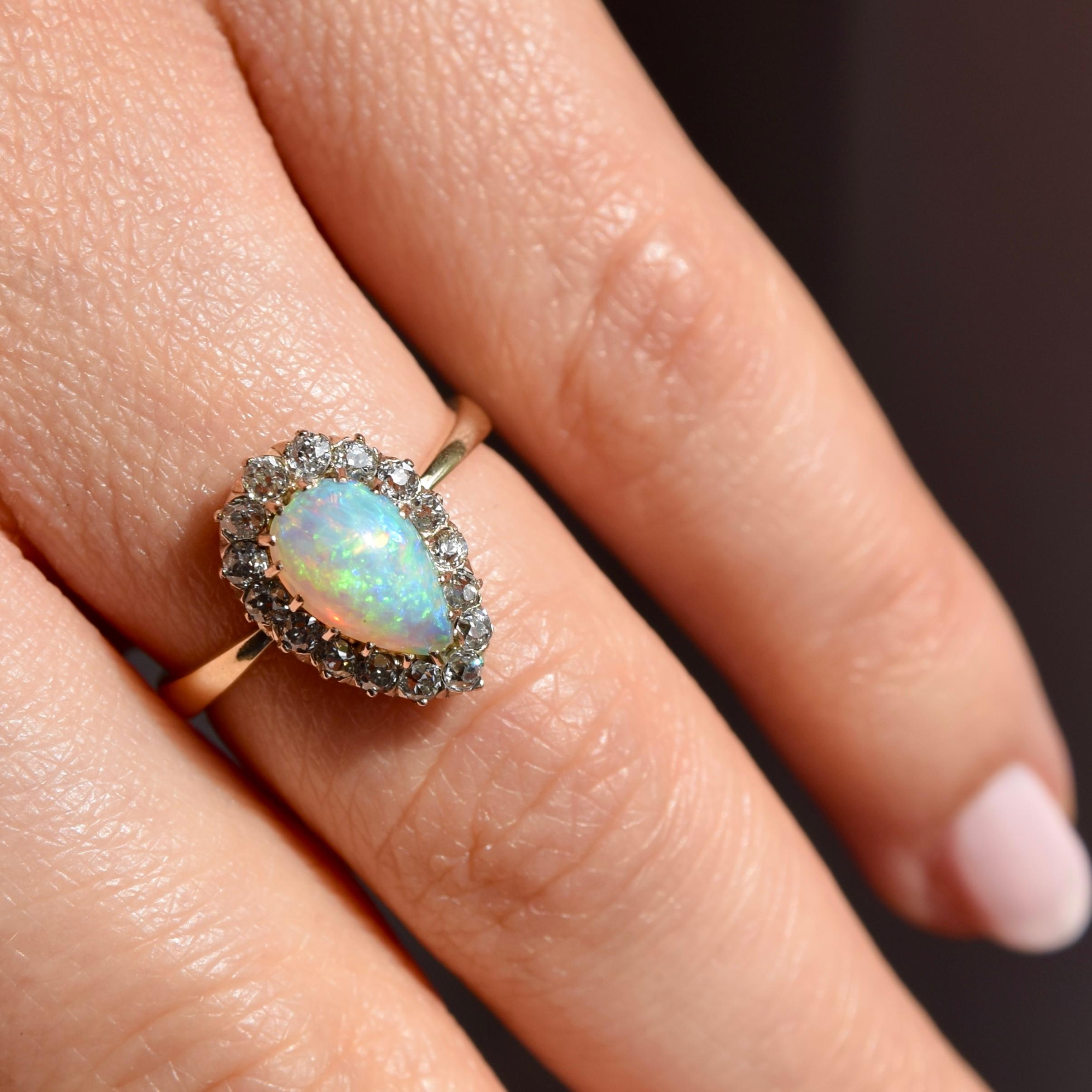 Opal Pear and 0.32 Carat Old Mine Cut Diamond Ring For Sale 1