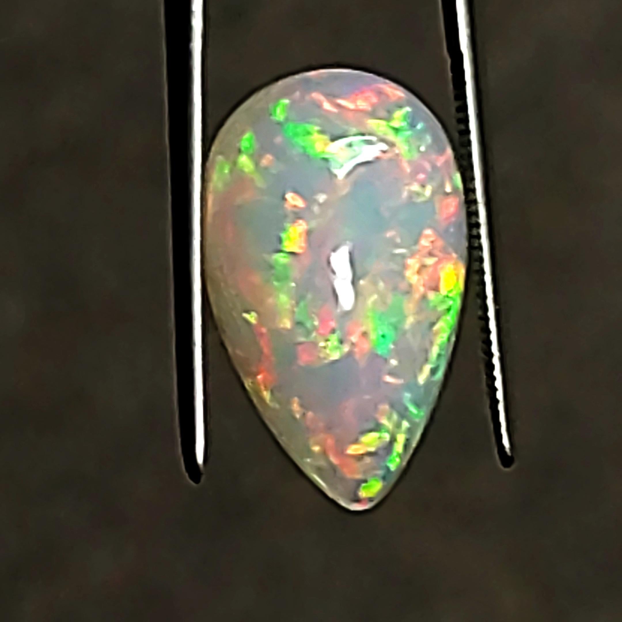 Opal - Pear Shape - approx 6.80ct - Incredible Play of Color! In New Condition For Sale In Methuen, MA
