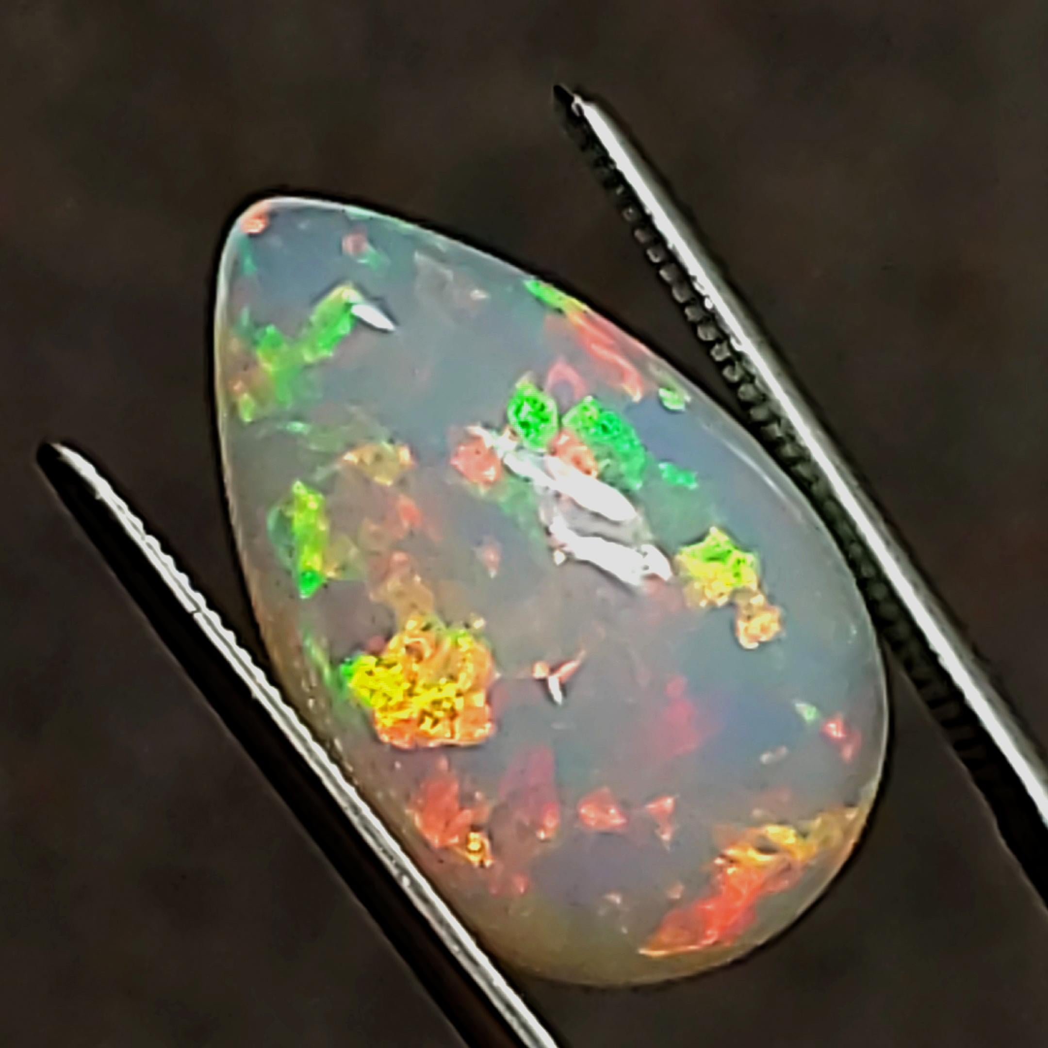 Women's or Men's Opal - Pear Shape - approx 6.80ct - Incredible Play of Color! For Sale