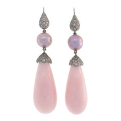 Boucles d'oreilles en or blanc avec opale et perle de Donald Huber