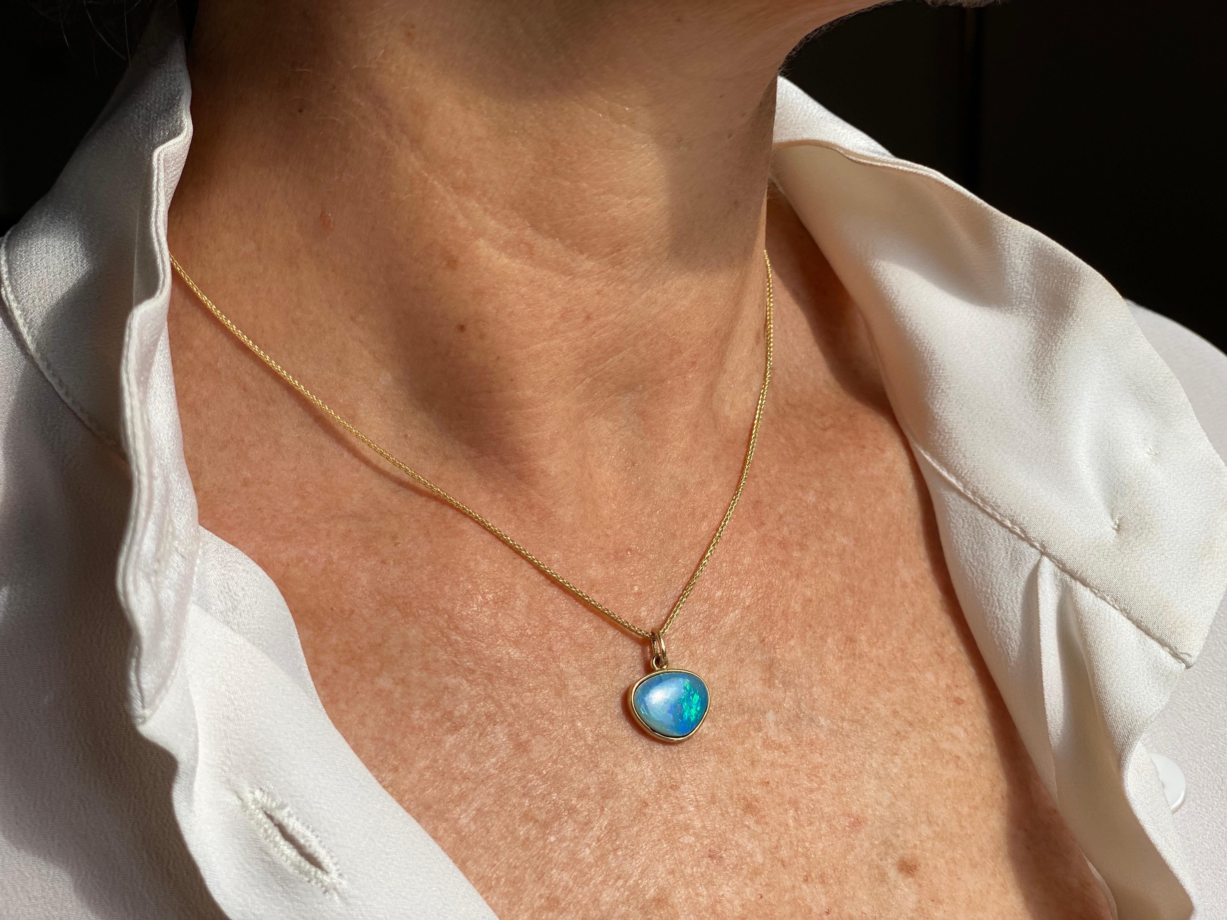 Introducing the mesmerizing Rossella Ugolini Opal Collection, where simplicity meets luminosity. This necklace, handcrafted in Italy with meticulous attention to detail, features an 18K yellow gold chain meticulously crafted like an Ear of Wheat