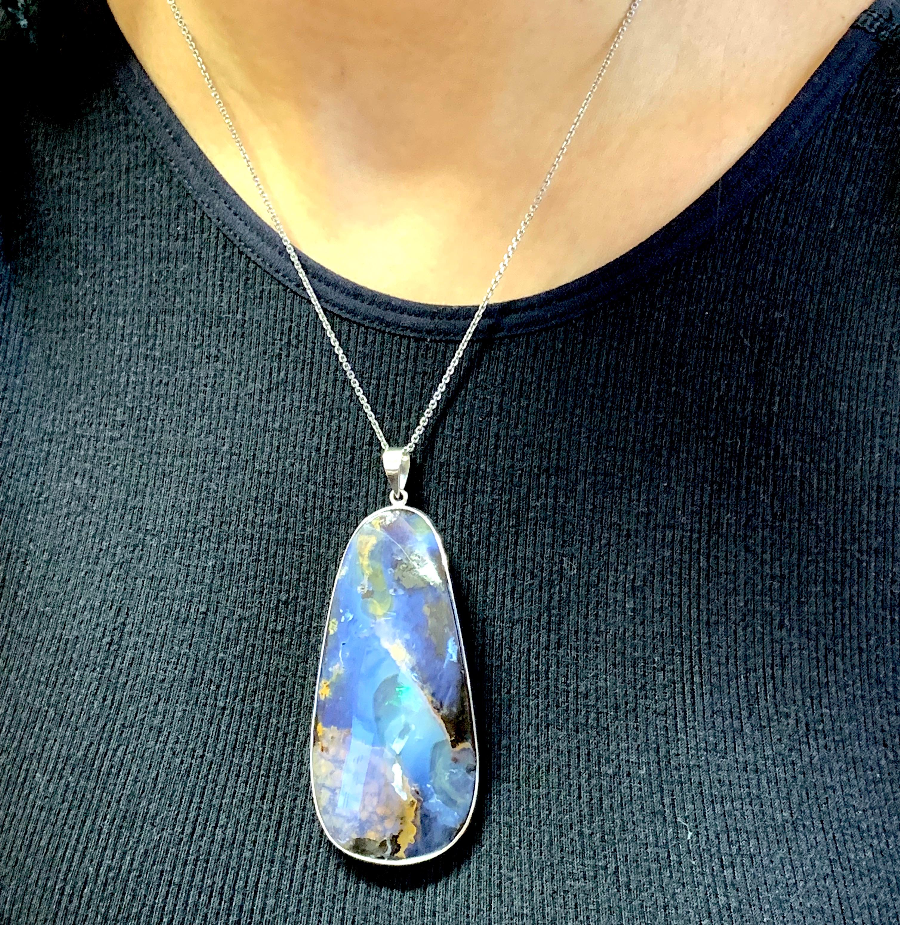 A unique piece, this Opal is a true showstopper! 

Material: Silver
Center Stone Details: 1 Opal - Measuring 65 x 30 mm

Fine one-of-a-kind craftsmanship meets incredible quality in this breathtaking piece of jewelry.