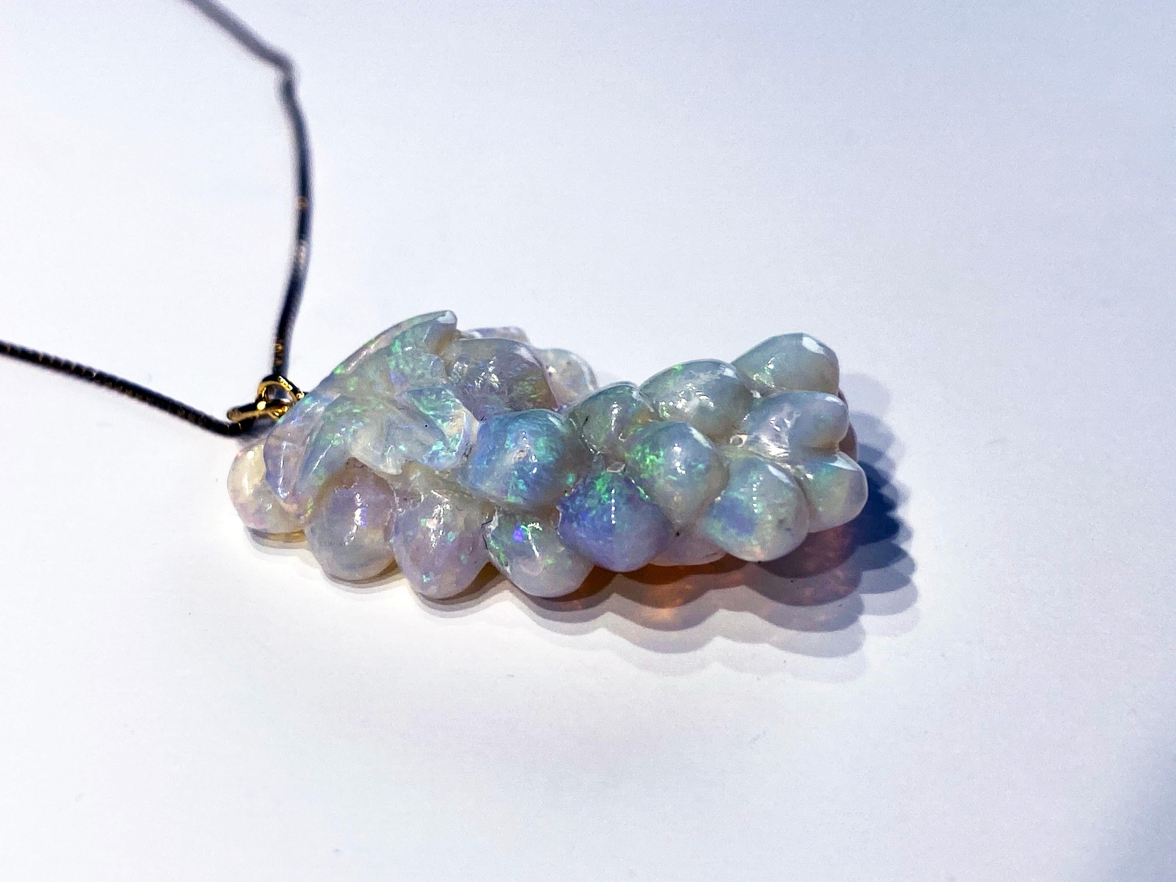 An Opal Pendant carved into a Grape Cluster on a Gold Plated 20