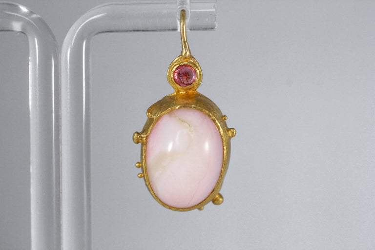 These subtle pink opal dangle drop earrings will make an elegant addition to any outfit. Rose earrings. They are comfortable and are easy to coordinate with any look. Handcrafted. One-of-a-kind.

These dangle drop earrings were inspired by Modern
