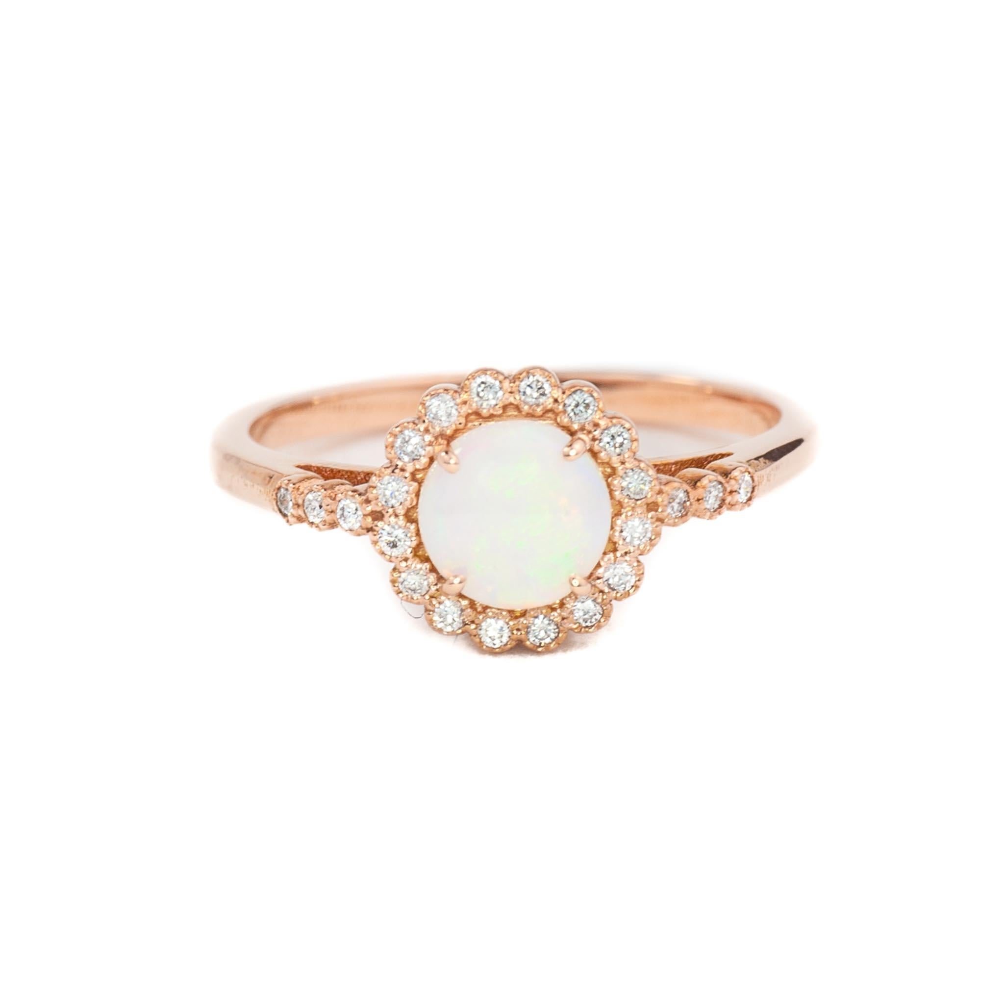 This vintage inspired design features an Australian opal with moissanites in the halo and band.

Australian Opals are better quality than Ethiopian opals.

Ethiopian opals cost significantly less because they are porous and will absorb water. A