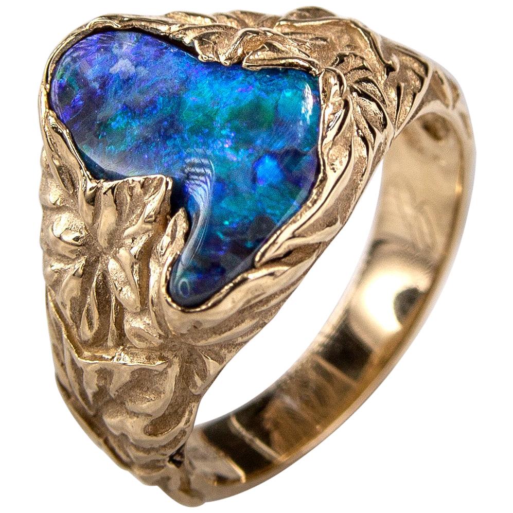 Yellow 14K gold ring with natural Black Opal 
opal origin - Australia 
opal measurements - 0.079 х 0.43 х 0.55  in / 2 х 11 х 14 mm
opal weight - 2.32 carats
ring size - 7 US (this ring may be resized, please contact us for further information)