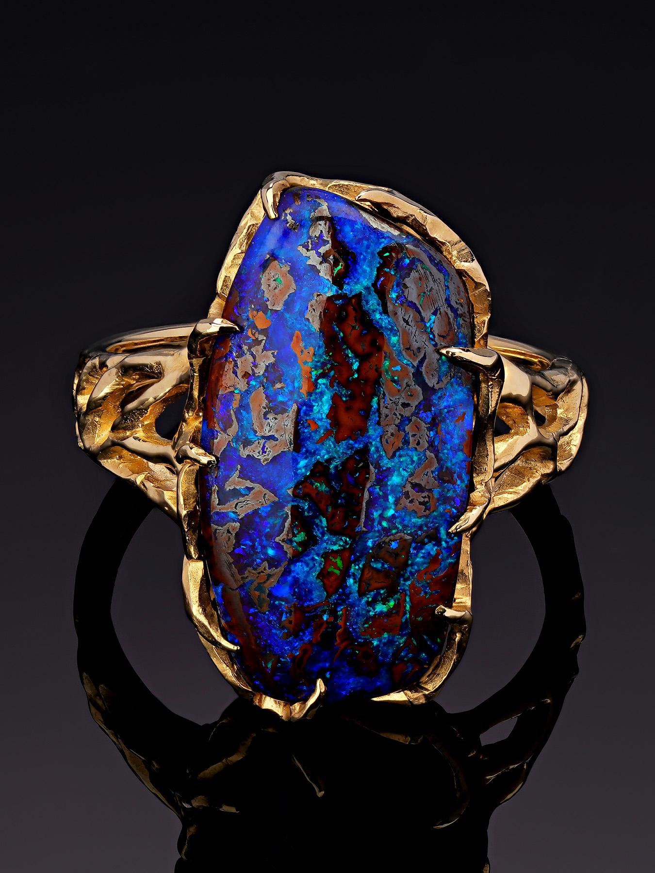 Vrubel collection - Boulder Opal ring in 14K yellow gold 
opal origin - Australia
opal measurements - 0,24 х 0.0,43 х 0,79 in / 6 х 11 х 20 mm
stone weight - 12.70 carats
ring weight - 6.89 grams
ring size - 7.5 US 


We ship our jewelry worldwide –