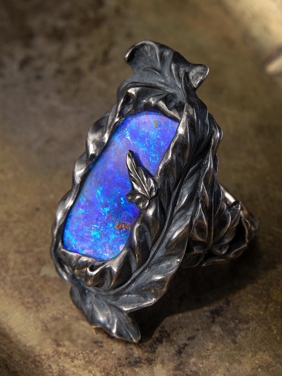 Large Boulder Opal 18K white gold and blackened silver ring
Opal origin - Australia
stone measurements - 0.51 х 1.06 in / 13 х 27 mm
ring weight - 40 grams
ring size - 8.5 US


We ship our jewelry worldwide – for our customers it is free of charge