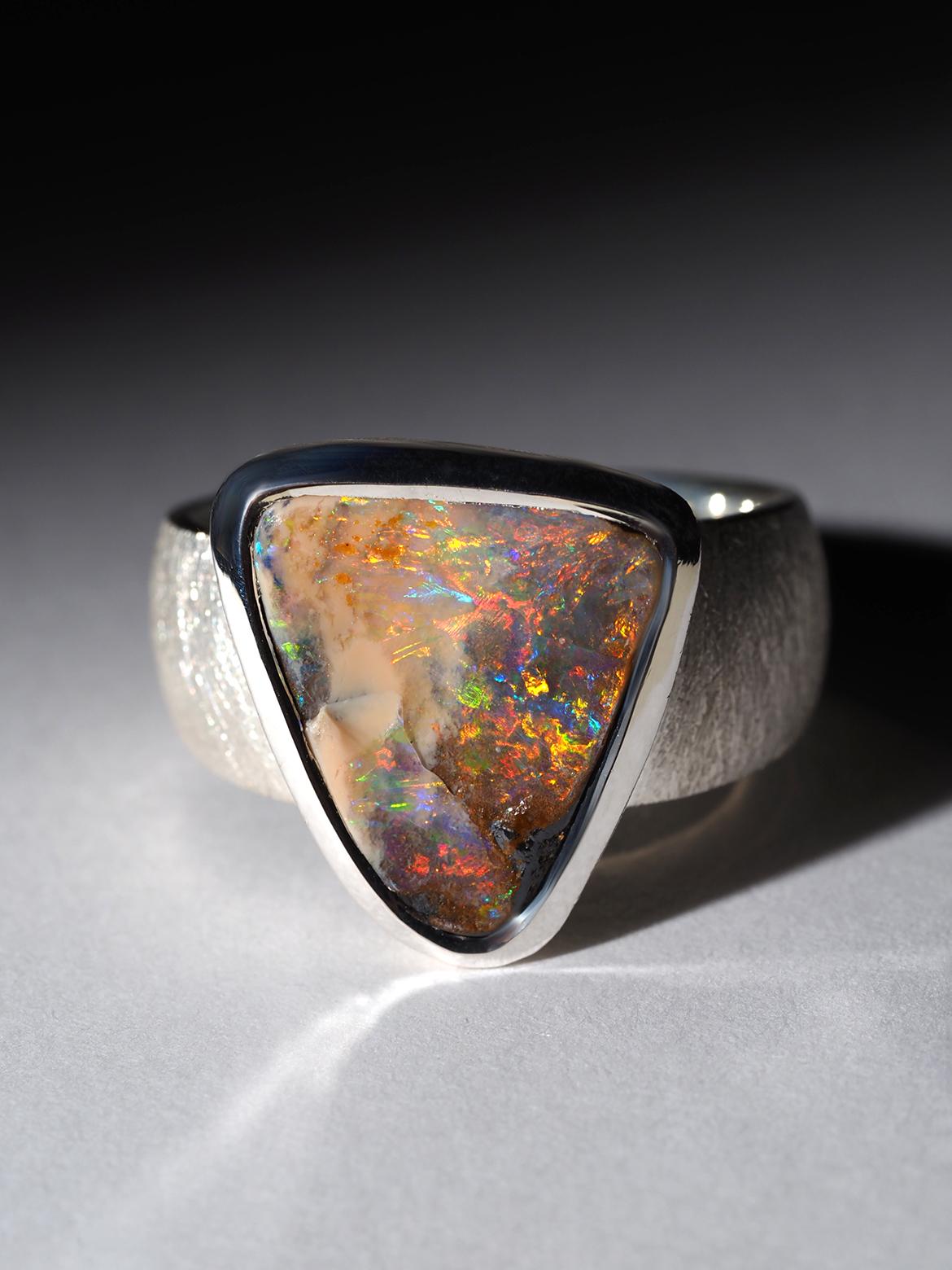 Scratched silver ring with natural bright Boulder Opal
opal origin - Australia
stone measurements - 0.55 х 0.66 in / about 14 х 17 mm
stone weight - 4.60 carats
ring size - 7.5 US / 56 EU
ring weight - 9 grams

