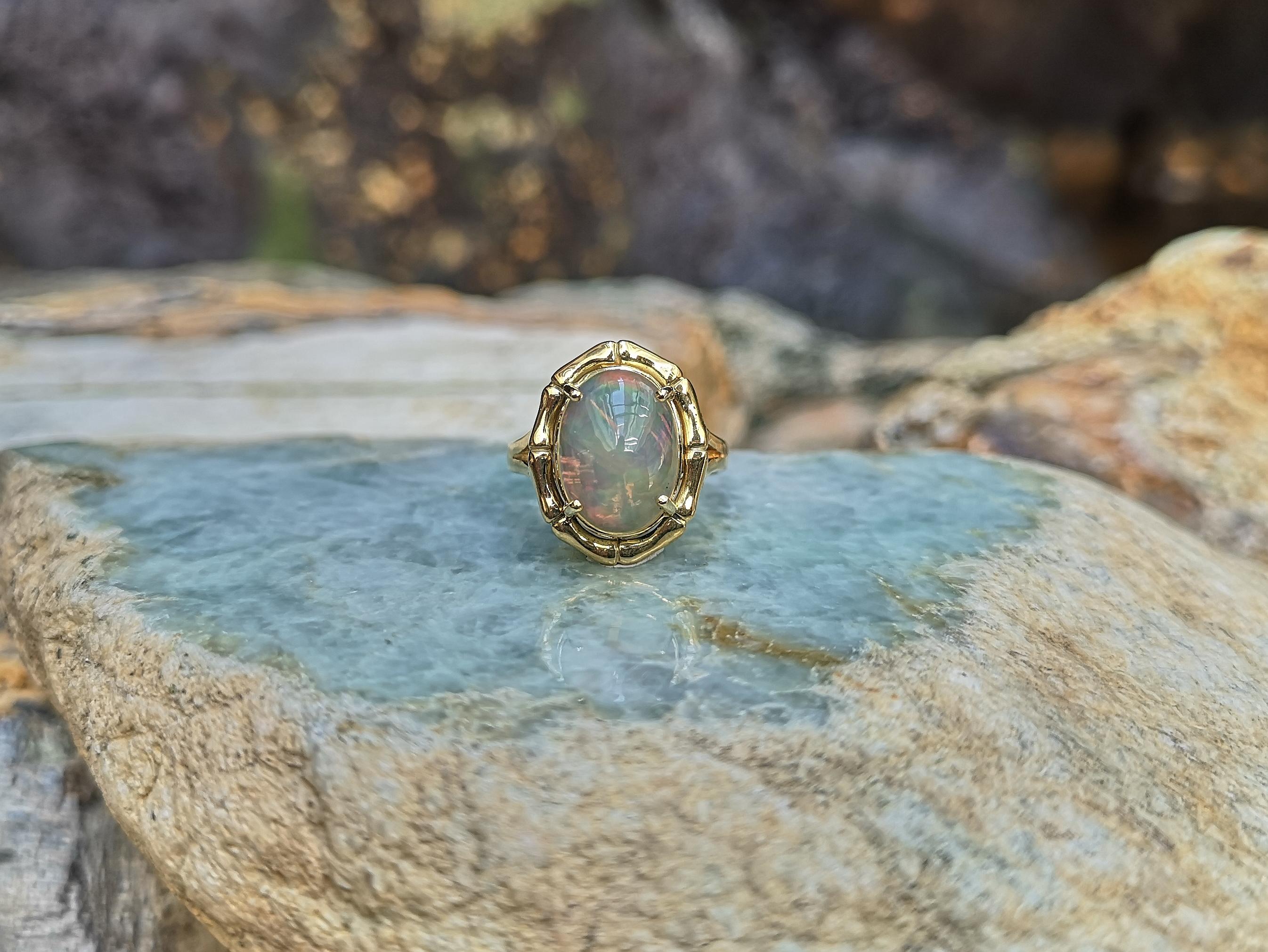 Cabochon Opal Ring Set in 18 Karat Gold Settings For Sale