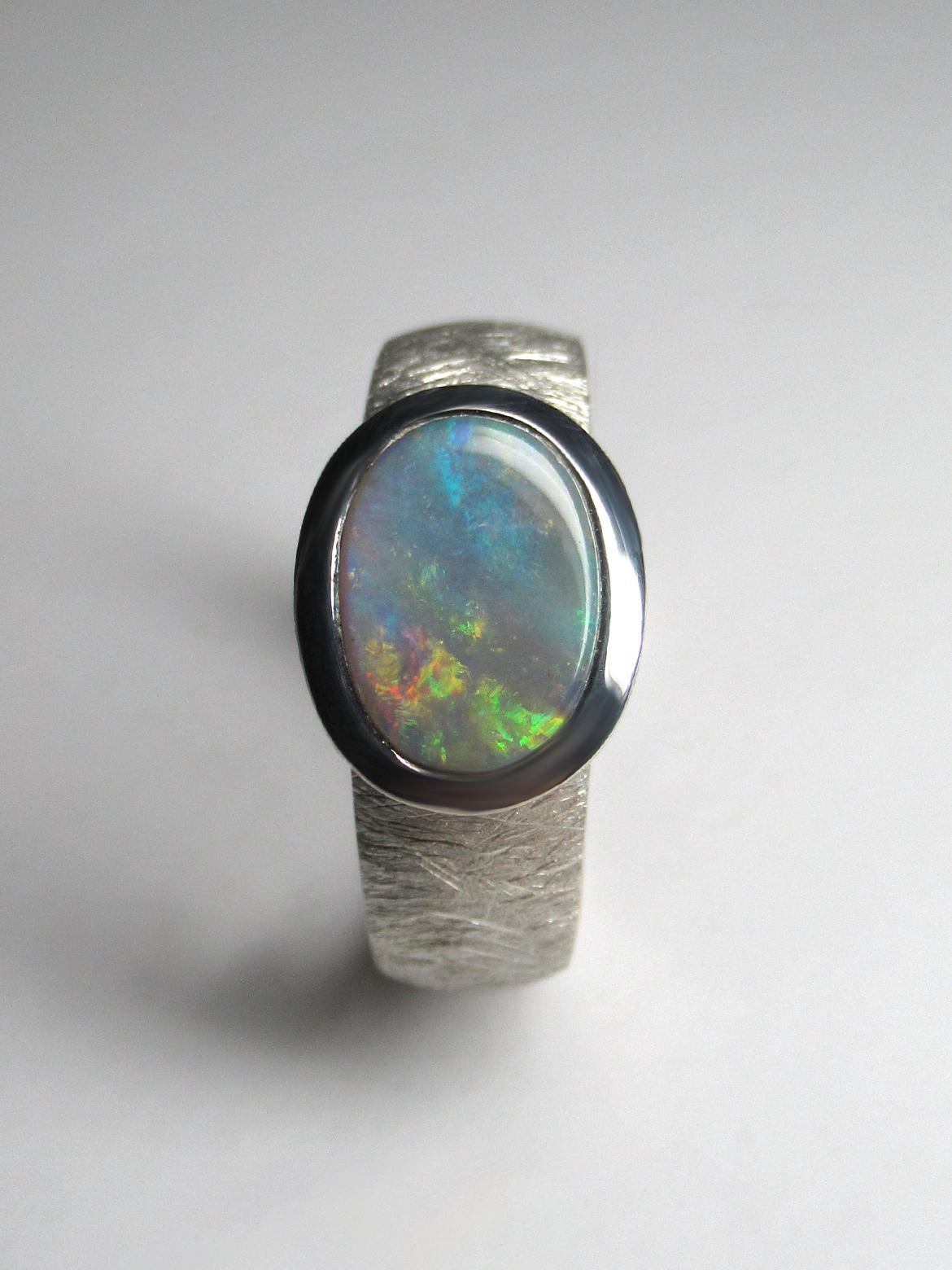 Silver ring with natural precious Opal
Opal origin - Australia
gemstone measurements 0.28 х 0.39 in / 7 х 10 mm
ring weight - 7.4 grams
ring size - 8 US
ref No 2447

Worldwide shipping from Berlin, Germany. Prices include all taxes, valid in Germany