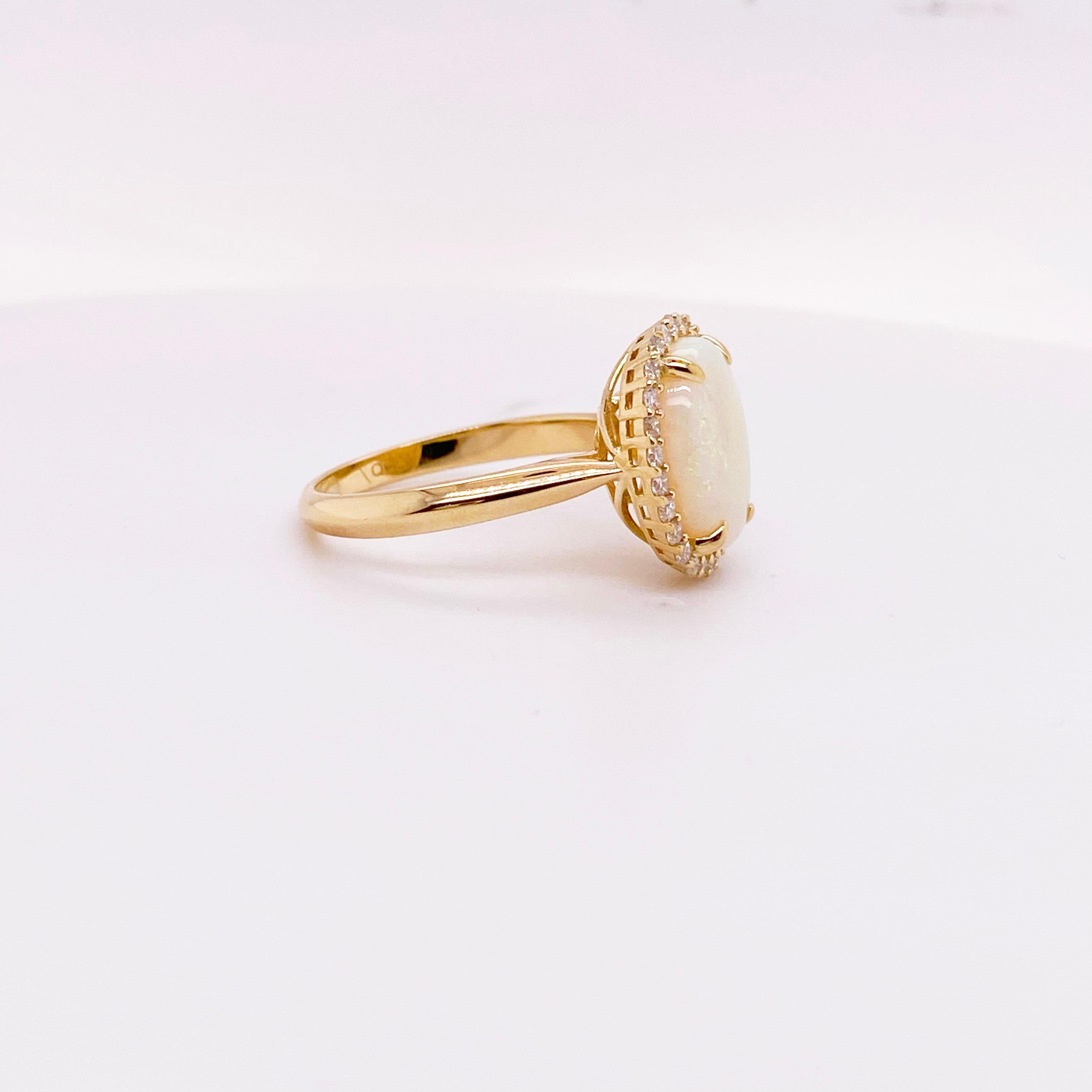 For Sale:  Opal Ring with a Diamond Halo Set 2.82 carats total weight gemstones Yellow Gold 3