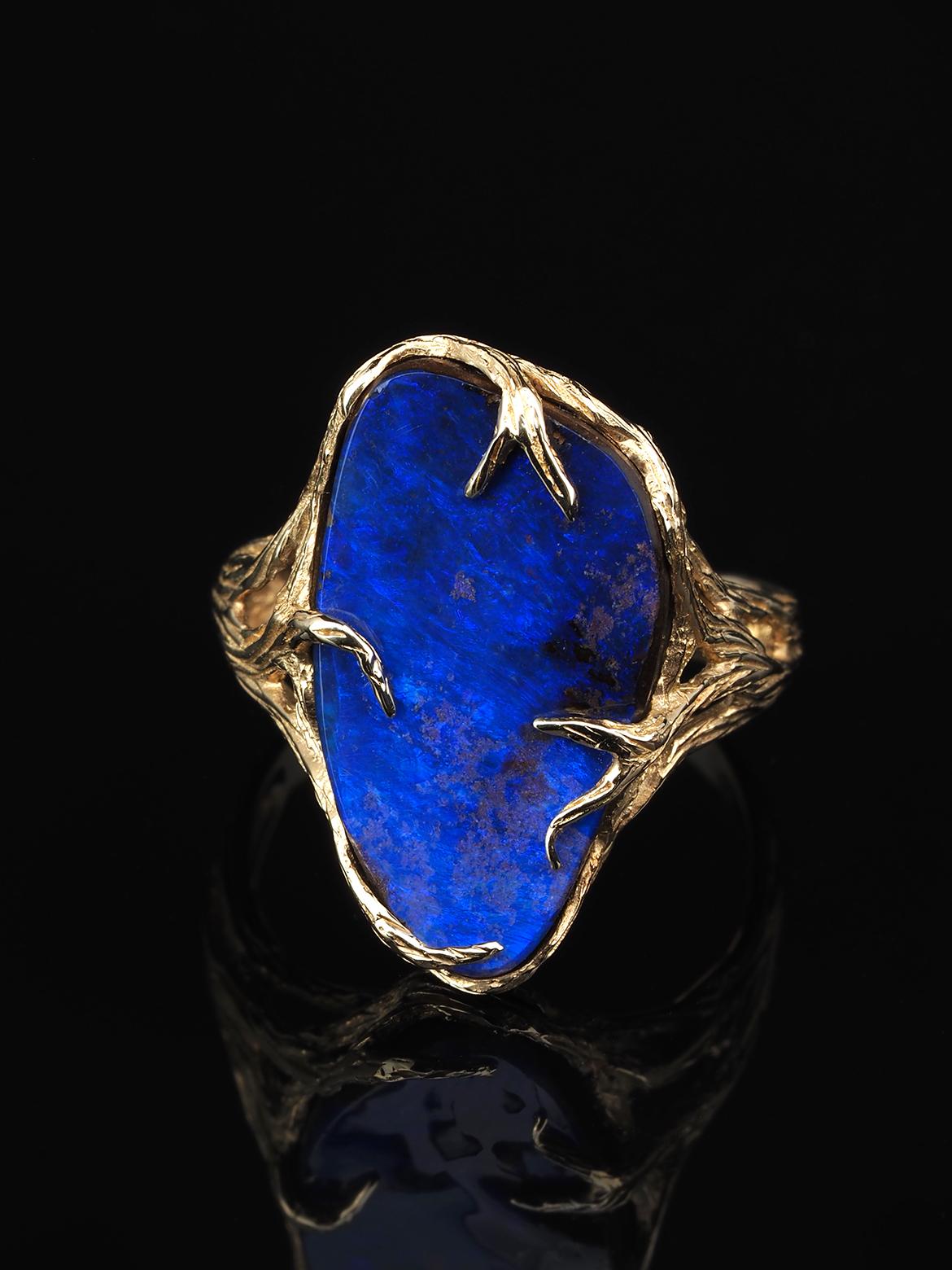 14K yellow gold ring with natural Boulder Opal
opal origin - Australia
opal weight - 9.26 carats
stone measurements - 0.12 х 0.43 х 0.83 in /  3 х 11 х 21 mm
ring weight - 5.72 grams
ring size - 7.75 US - 57 EU (this ring may be resized, please