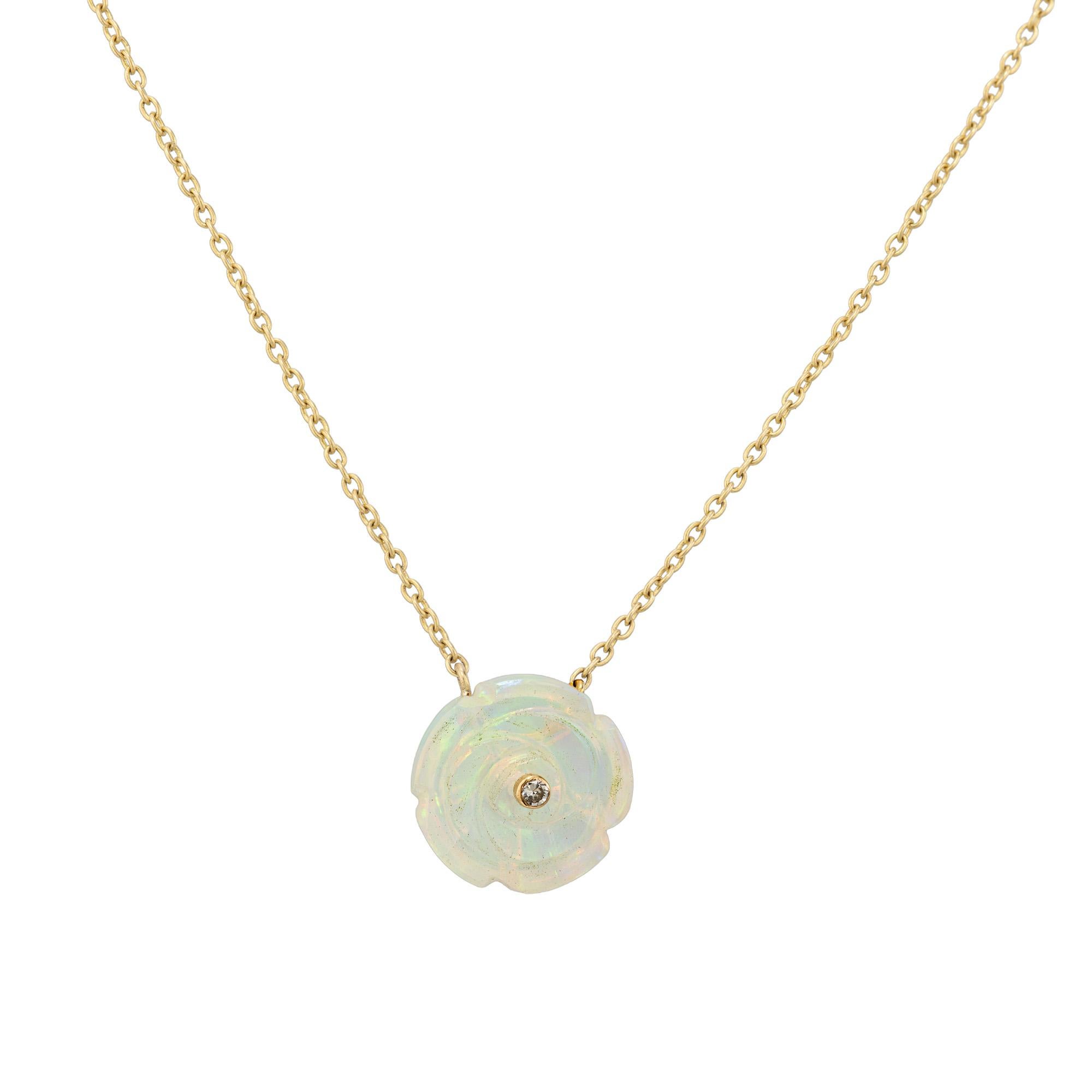 Where fire meets flower, and light lives in every petal.

Inspired by the grace of my daughter and the quiet magic of nature, the Maegelle collection features hand-carved opal roses, each centered with a brilliant diamond. Opals, with their