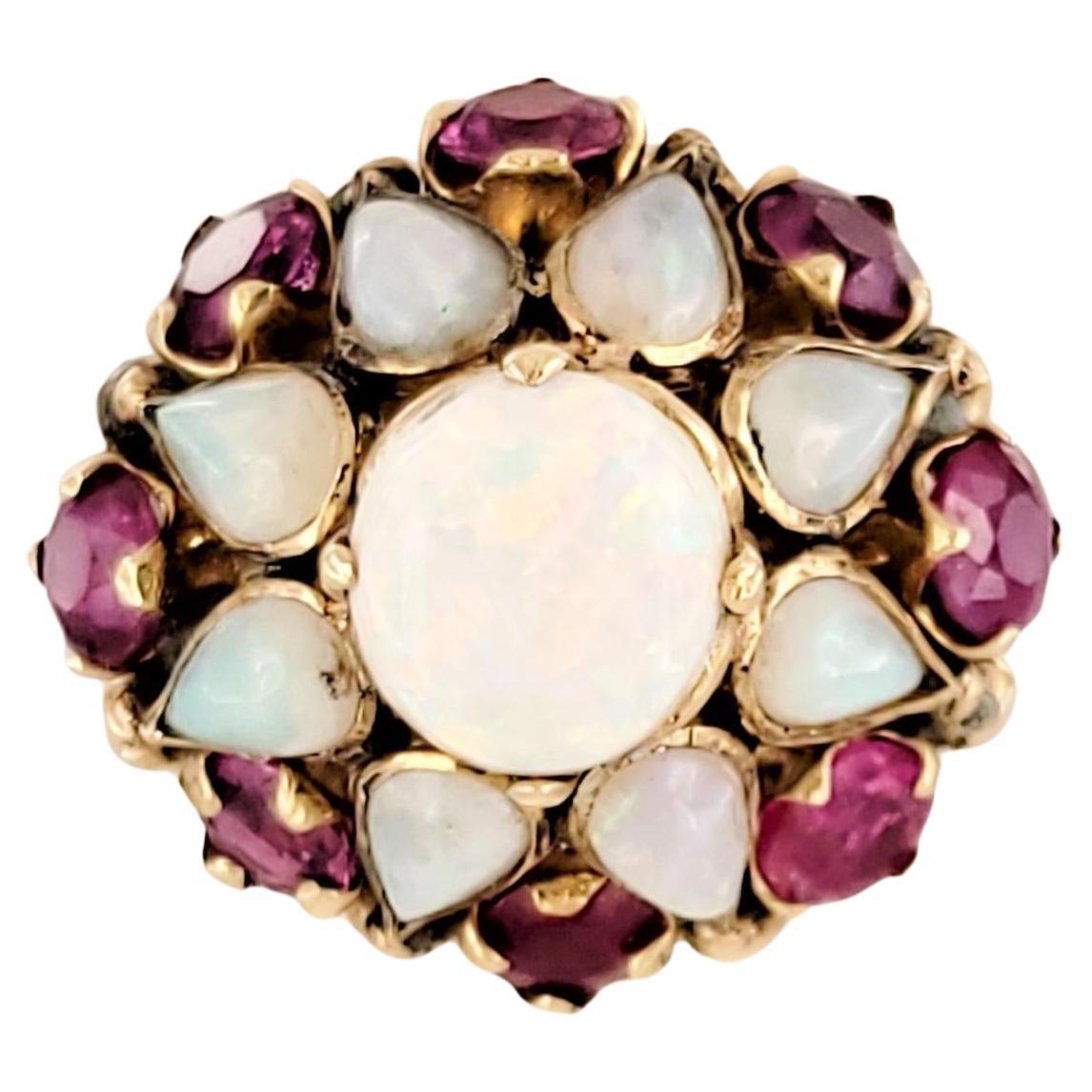 Anillo en racimo de ópalo y rubí