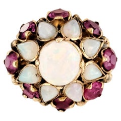 Anillo en racimo de ópalo y rubí