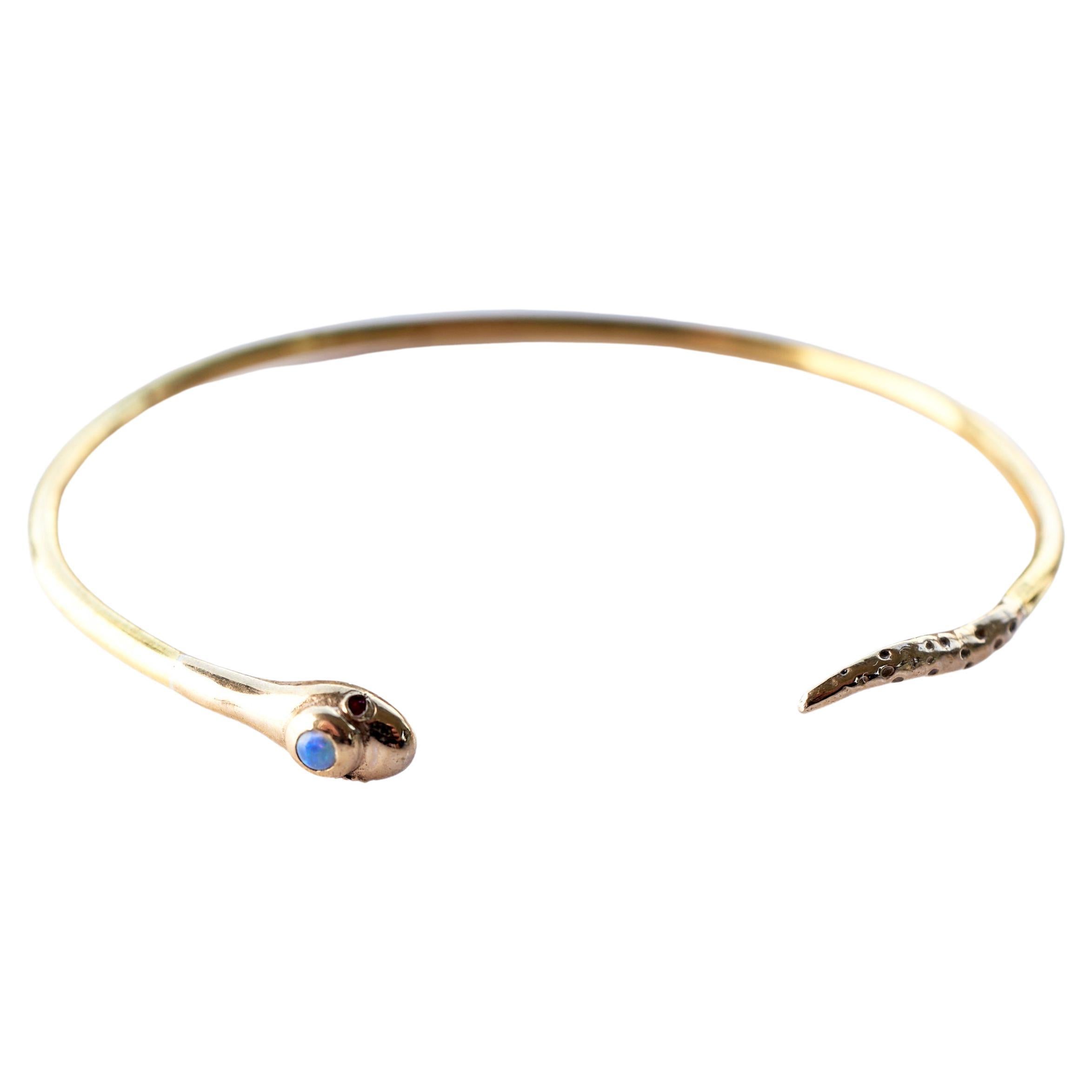 Victorien Bracelet manchette jonc serpent en opale, rubis et bronze J Dauphin Animal Jewelry en vente