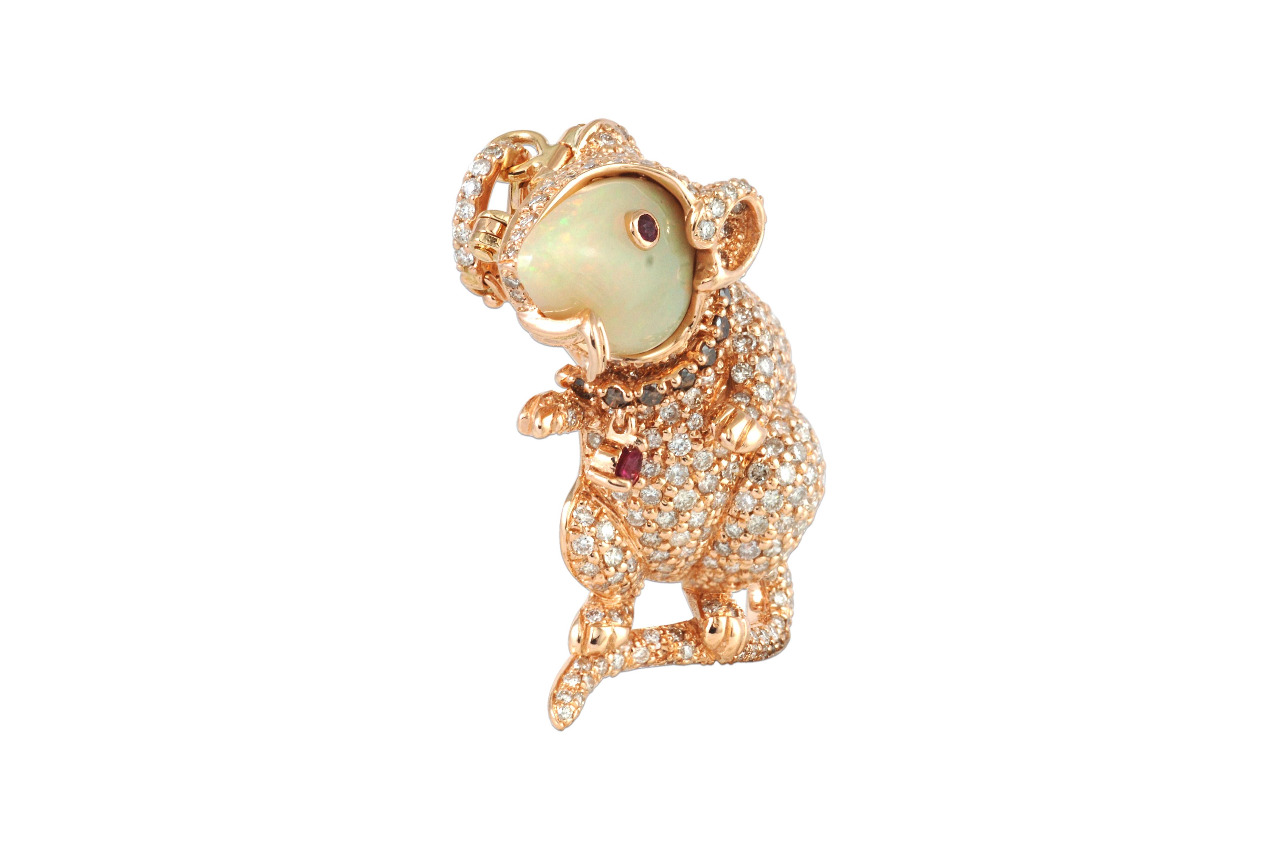 Opal 2.45 carats, Ruby 0.10 carat with Brown Diamond 3.26 carats Brooch set in 18 Karat Rose Gold Settings 

Width: 2.0 cm
Length: 4.2 cm 

