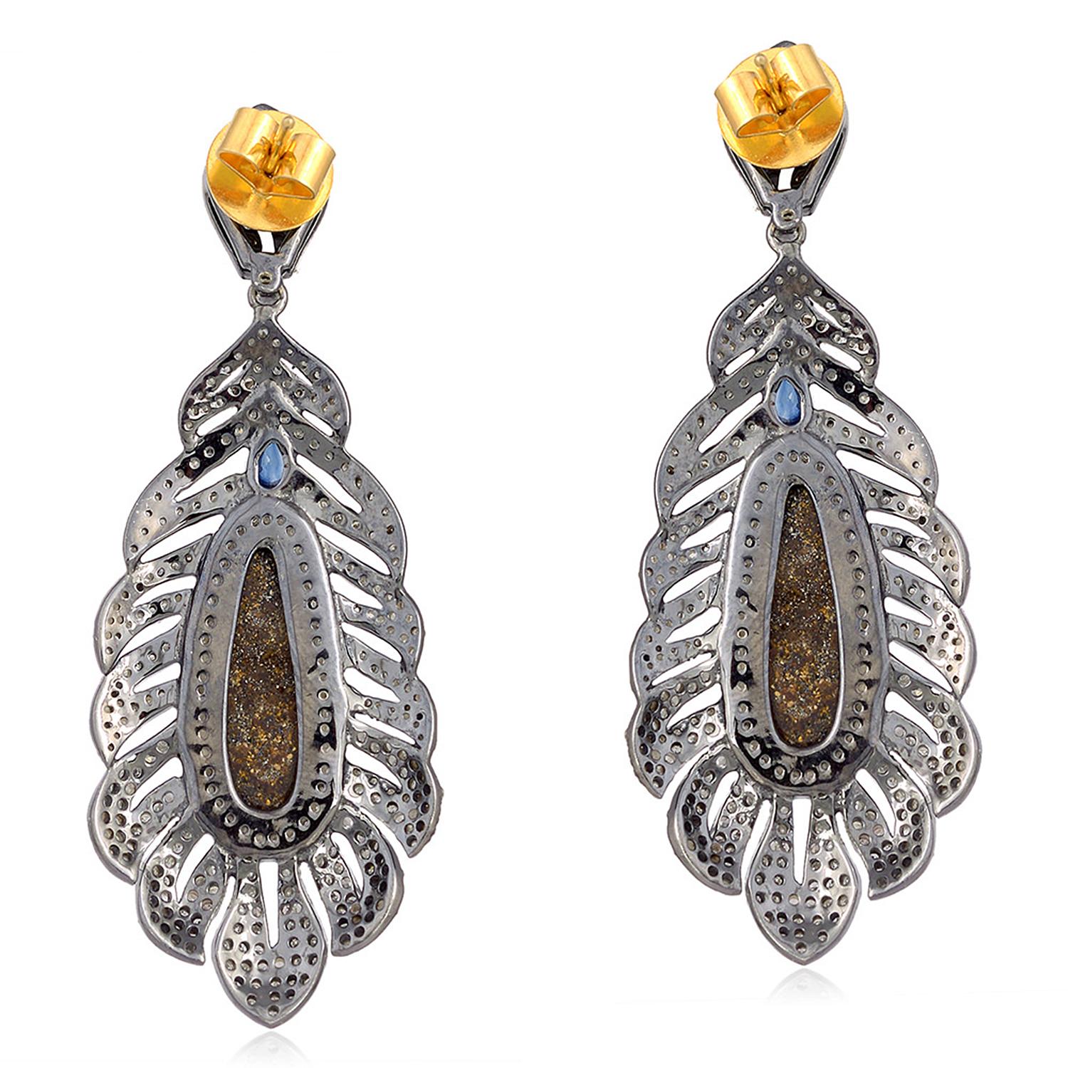 These stunning earrings are handmade in 18-karat gold and sterling silver.  
It is set with 5.8 carats opal doublets, .50 carats blue sapphire and 2.56 carats diamonds in blackened finish. 

FOLLOW  MEGHNA JEWELS storefront to view the latest