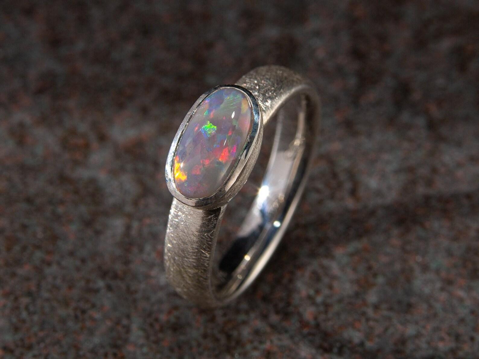 Silver ring with Dark Opal
opal origin - Australia
gem size is 0.79 x 0.31 x 0.39 in / 2 х 8 х 10 mm
opal weight - 1.06 carats
ring size - 7 US
ring weight - 3.73 grams