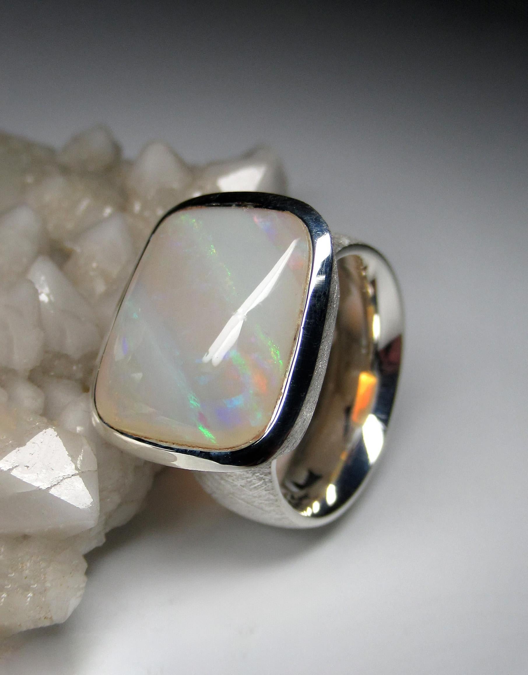 Silver ring with natural Opal 
gemstone origin - Australia
opal measurements - 0.16 x 0.55 x 0.67 in / 4 x 14 x 17 mm
opal weight - 11.13 carats
ring size - 8 1/4 US
ring weight - 13.41 grams