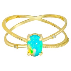 Anello Opale a Spirale, Anello Opale Cabochon Ovale, Anello Opale in Oro