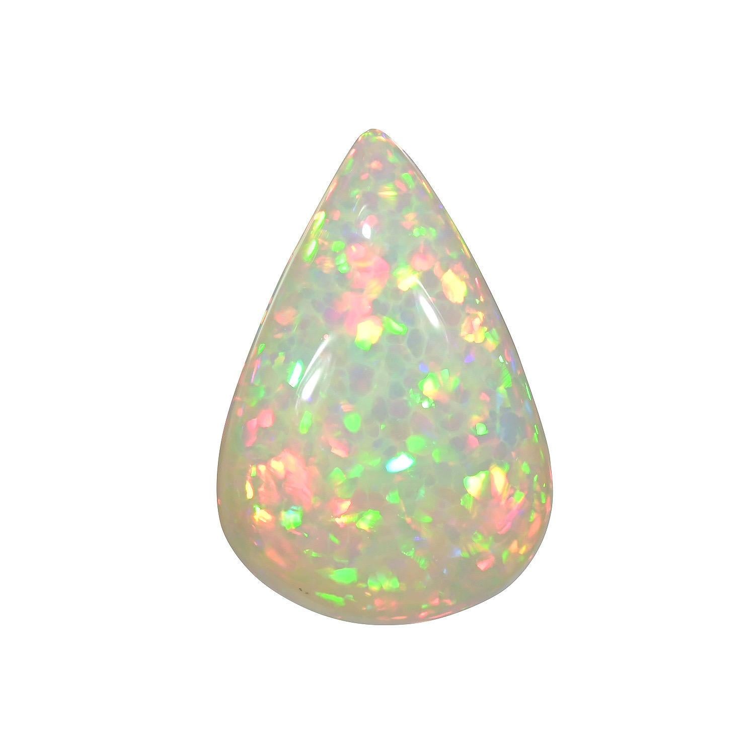 Natural 10.37 carat pear shape Ethiopian Opal loose gemstone, offered unmounted to a unique gem lover.
Returns are accepted and paid by us within 7 days of delivery.
We offer supreme custom jewelry work upon request. Please contact us for more