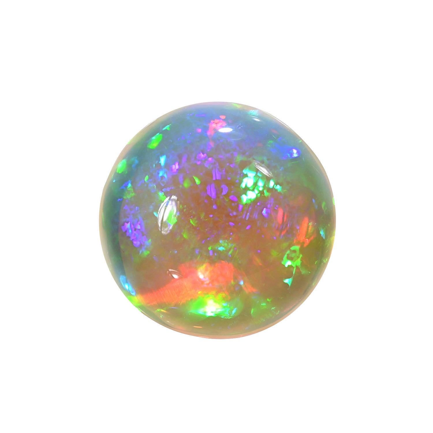 Natural 29.98 carat round Ethiopian Opal loose gemstone, offered unmounted to a fine gem connoisseur.
Returns are accepted and paid by us within 7 days of delivery.
We offer supreme custom jewelry work upon request. Please contact us for more