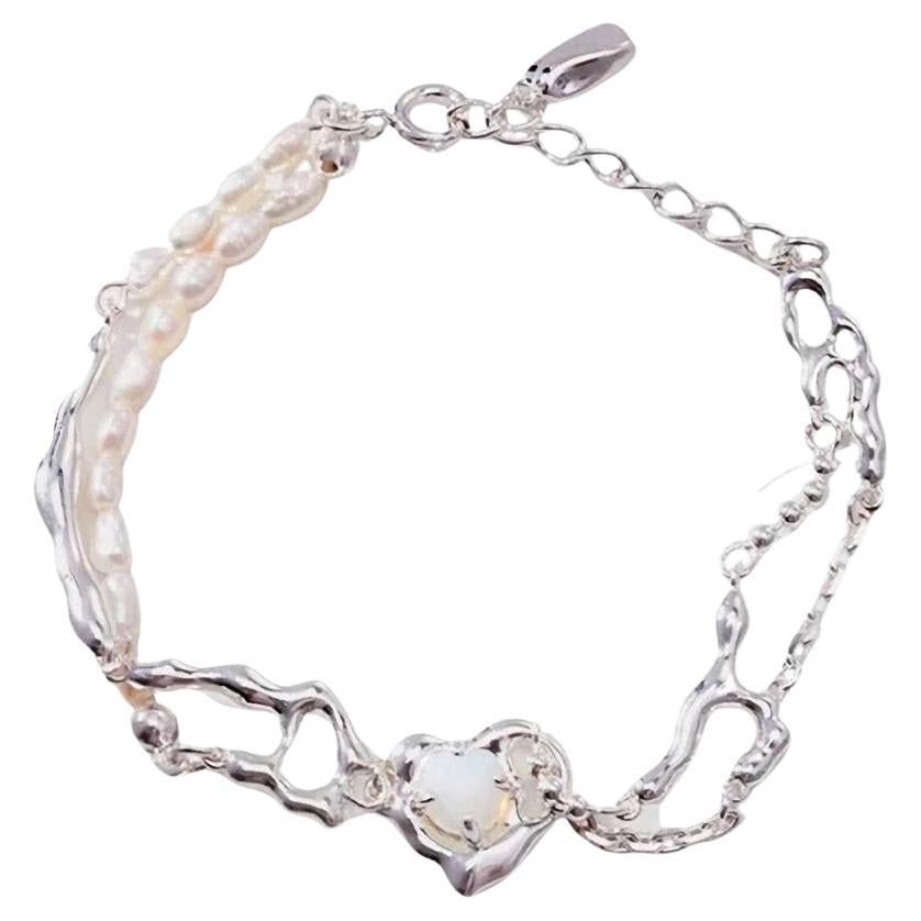 Bracelet en argent avec pierre d'opale et perle d'eau douce