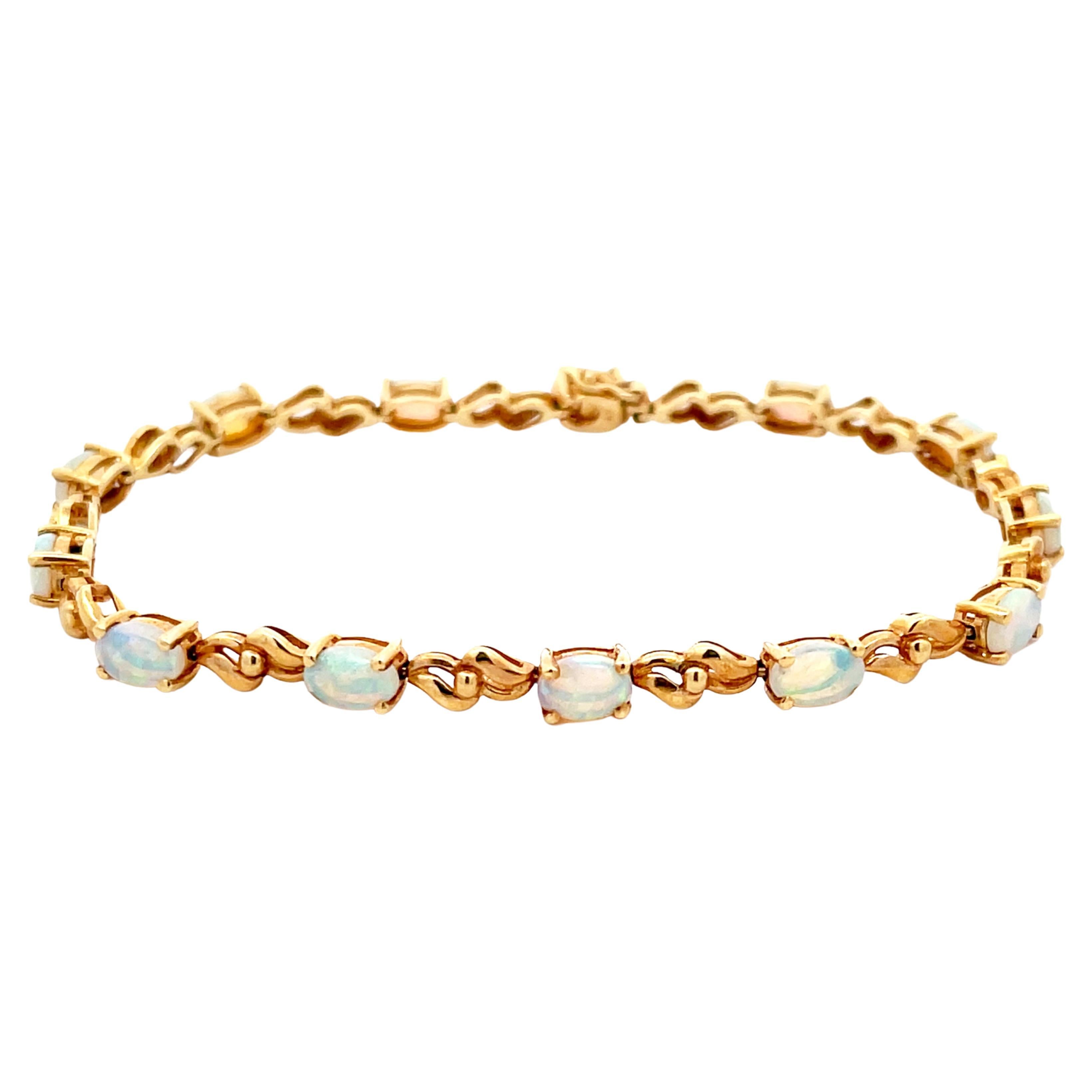 Opal Tennis Bracelet in 14k Yellow Gold For Sale