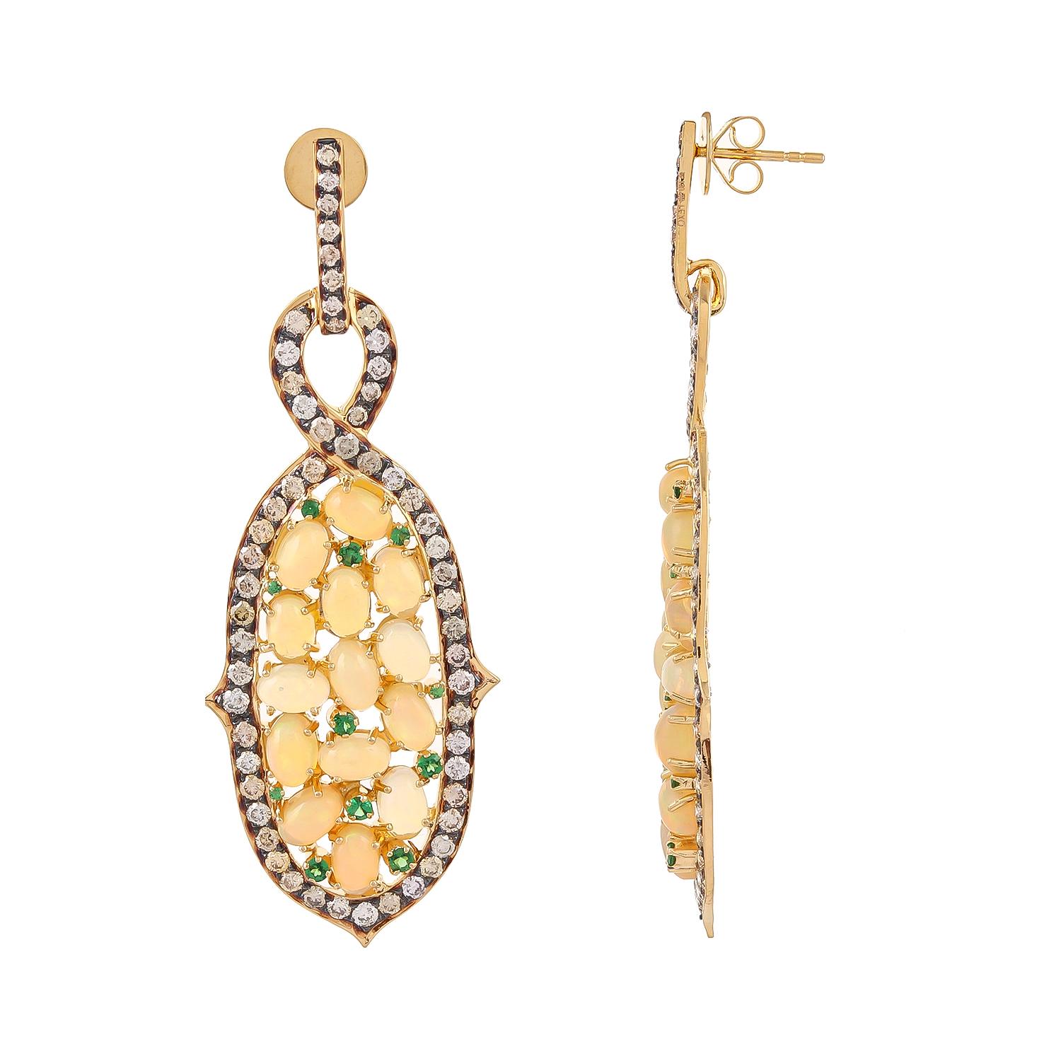 Interesting combination of opal cabochons weighing a total of 10.61cts and tsavorites weighing 0.63cts are set in an unusual shape of byzantine shapes. 4.39ct diamonds accented in black rhodium enhance the total look of these 18kt gold ear