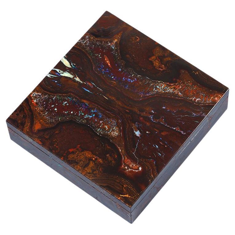 An unique 100% handmade Boulder Opal Gemstone in wooden box 
size of the stone vanity case 168 x 163 x 44 mm
weight of the stone box - 1660 gr
total weight with wooden case - 2500 gr