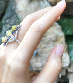 Opal with Blue Sapphire and Diamond Ring Set in 18 Karat White Gold Settings