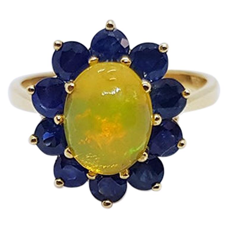 Opal with Blue Sapphire Ring Set in 18 Karat Gold Settings For Sale