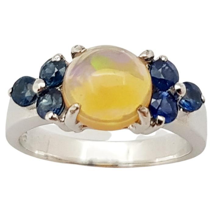 Opal with Blue Sapphire Ring set in Silver Settings For Sale
