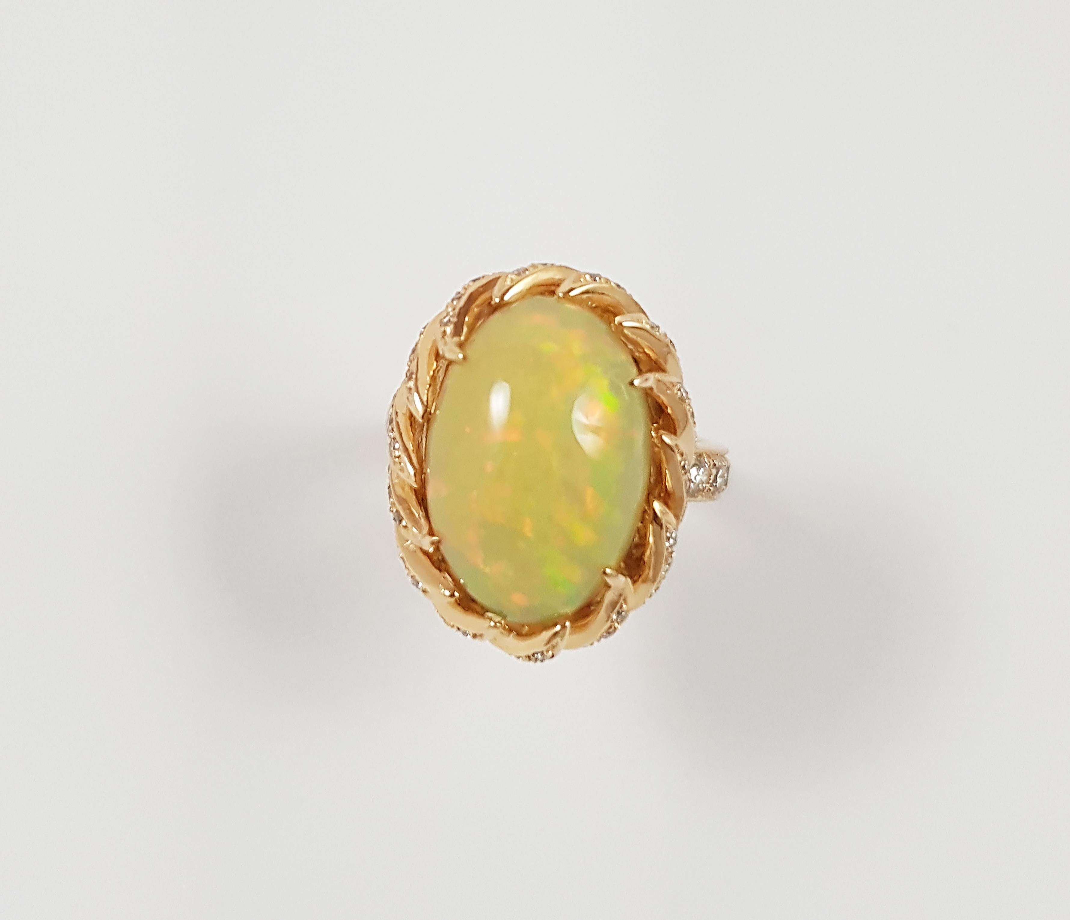 Opal 6.12 carats with Brown Diamond 0.87 carats Ring set in 18 Karat Rose Gold Settings

Width: 1.9 cm
Length: 1.6 cm 
Ring Size: 51

