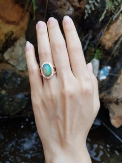 Opal with Brown Diamond Ring Set in 18 Karat Rose Gold Settings