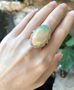 Anello Opale con diamante marrone incastonato in oro rosa 18 carati