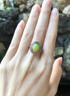 Opal with Brown Diamond Ring Set in 18 Karat Rose Gold Settings