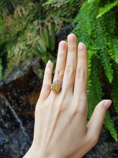 Opal with Brown Diamond Ring Set in 18 Karat White Gold Settings