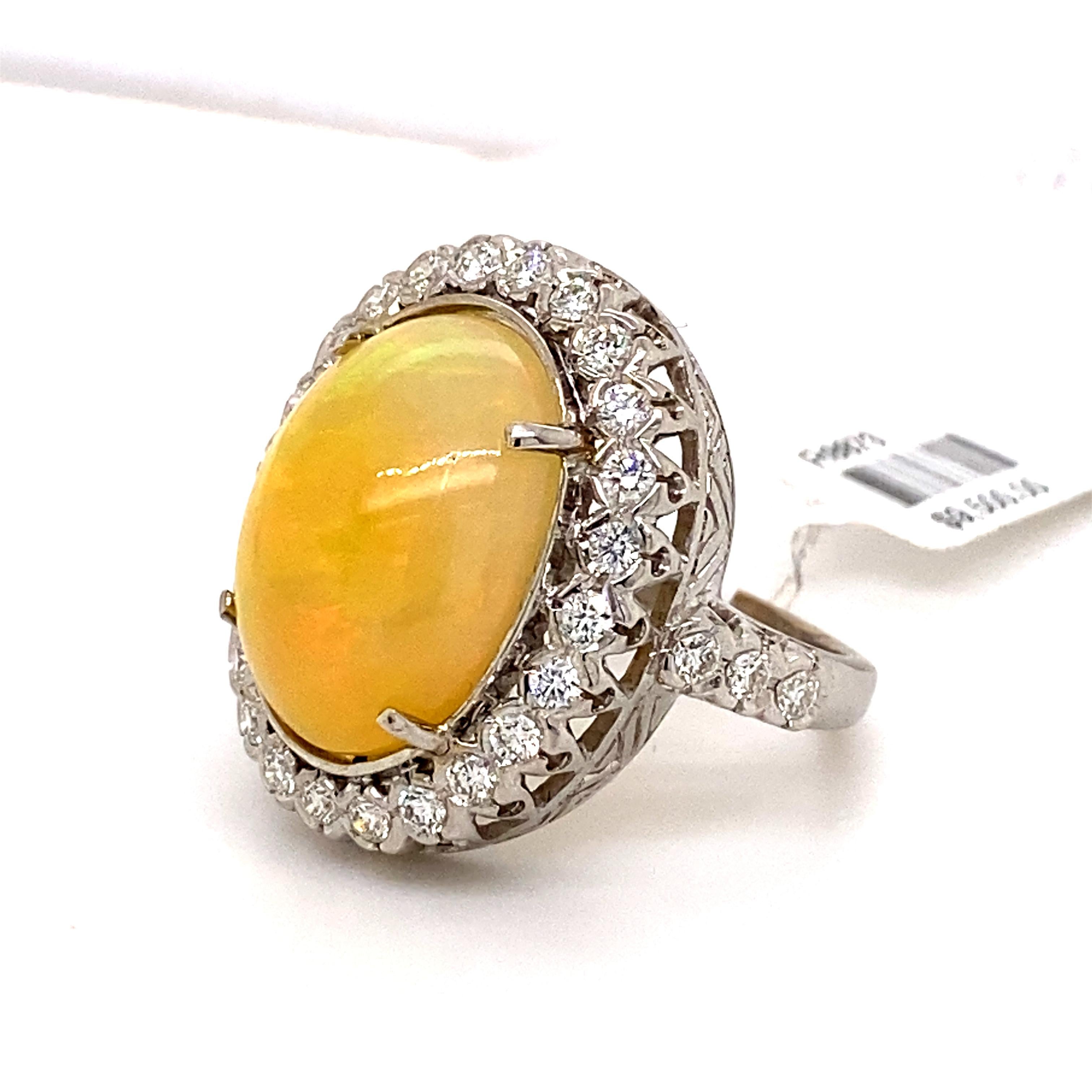 Contemporary Opal with Diamond Halo Ring 18k White Gold For Sale